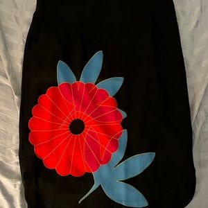 Ann Taylor Loft black skirt with a flower, size 6. Lined.